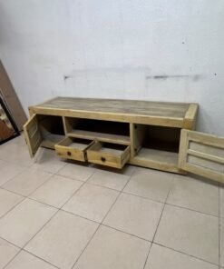 The TV stand shown in the image—a "Band TV" unit—is crafted from natural wood and features an industrial-style design. It includes two side doors, an open shelf in the center, and two small drawers at the bottom. - Image 4