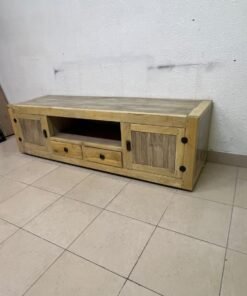 The TV stand shown in the image—a "Band TV" unit—is crafted from natural wood and features an industrial-style design. It includes two side doors, an open shelf in the center, and two small drawers at the bottom. - Image 6