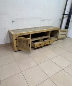 The TV stand shown in the image—a "Band TV" unit—is crafted from natural wood and features an industrial-style design. It includes two side doors, an open shelf in the center, and two small drawers at the bottom. - Image 9