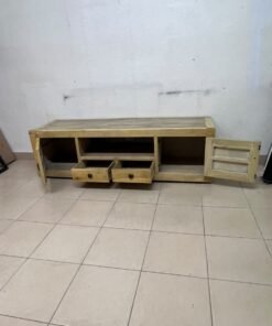 The TV stand shown in the image—a "Band TV" unit—is crafted from natural wood and features an industrial-style design. It includes two side doors, an open shelf in the center, and two small drawers at the bottom. - Image 10