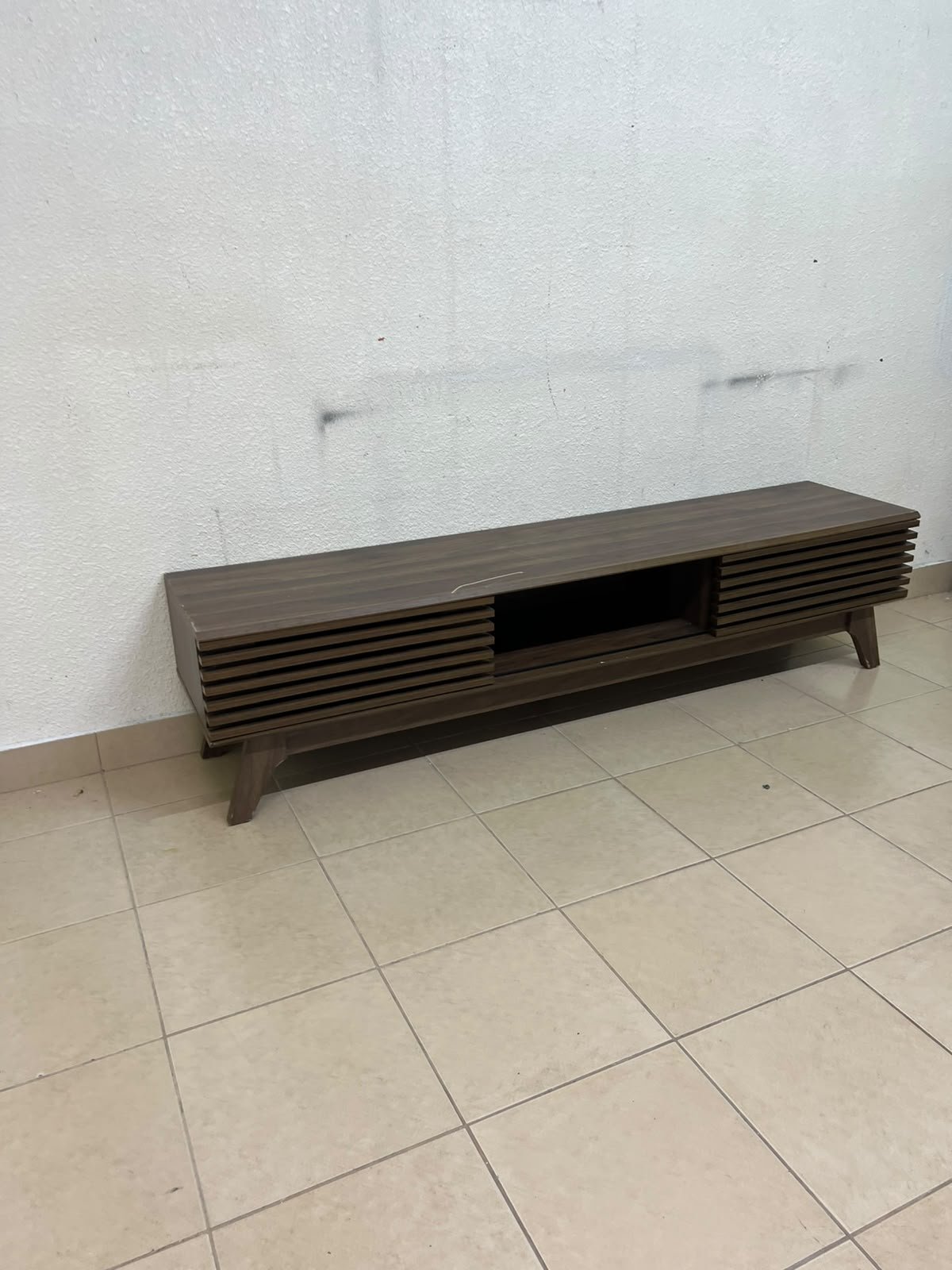 A modern-design wooden TV unit in a walnut finish—the Echo TV Unit from Home Centre UAE.