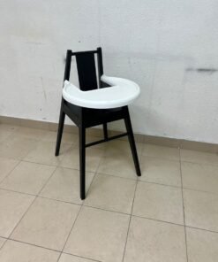 IKEA BLÅMES high chair for children, in black with a white tray.