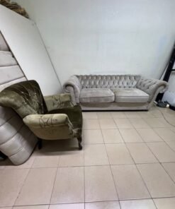 Classic Chesterfield-style furniture upholstered in velvet, featuring a long grey or silver sofa with a button-tufted backrest, accompanied by a matching armchair (fauteuil) in a dark green or olive shade, sharing the same plush, classic design. - Image 9