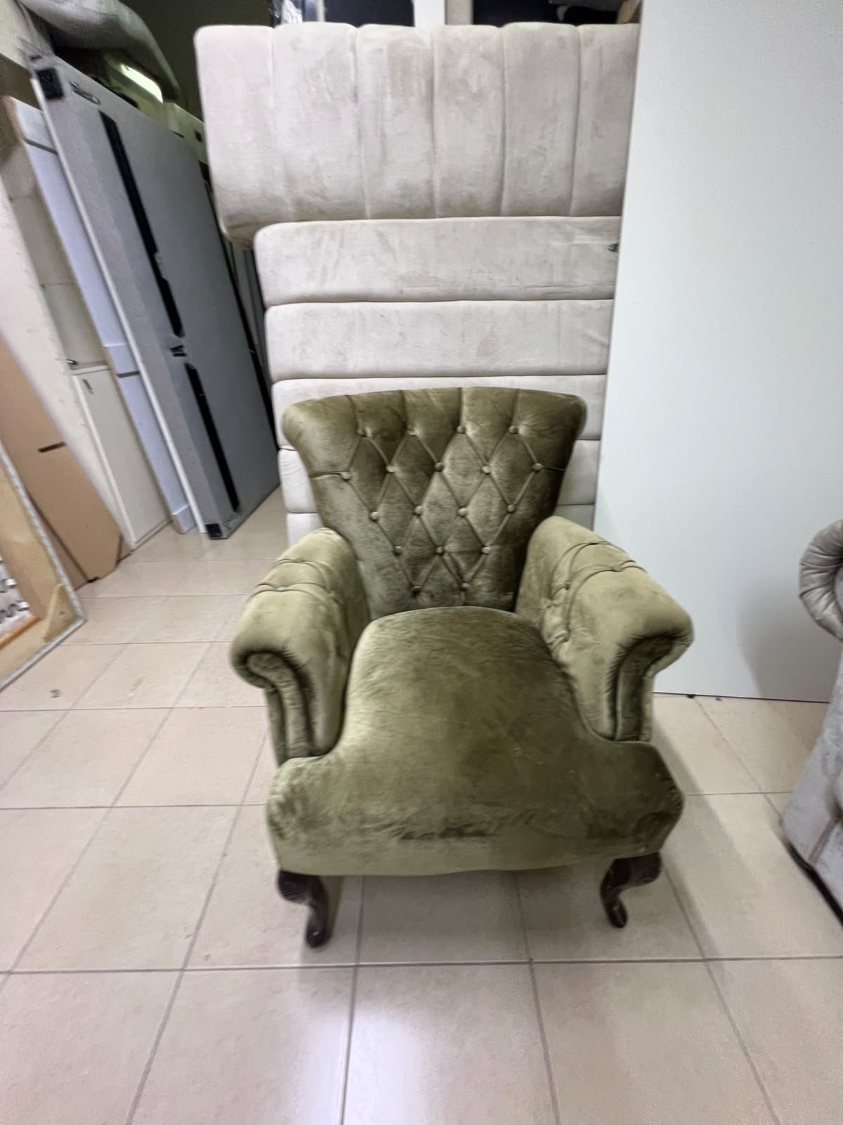 Classic Chesterfield-style furniture upholstered in velvet, featuring a long grey or silver sofa with a button-tufted backrest, accompanied by a matching armchair (fauteuil) in a dark green or olive shade, sharing the same plush, classic design. - Image 5