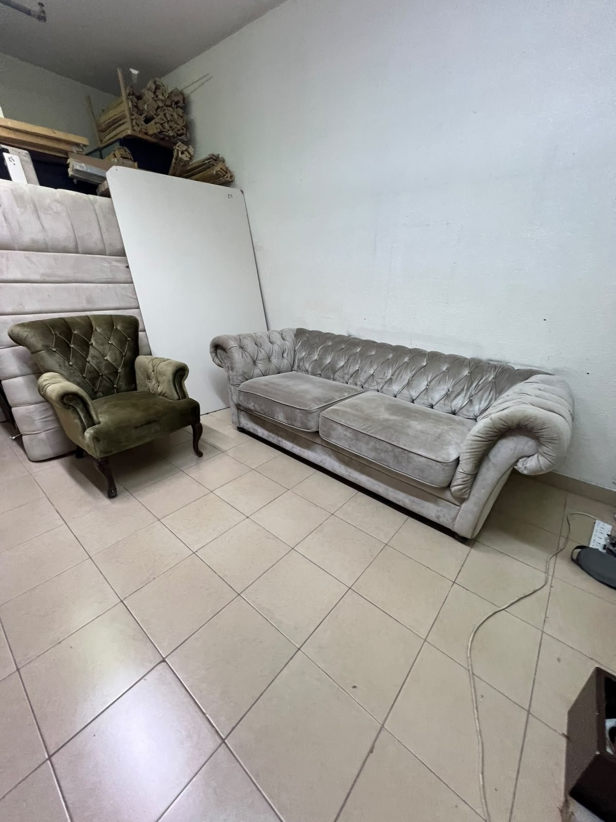 Classic Chesterfield-style furniture upholstered in velvet, featuring a long grey or silver sofa with a button-tufted backrest, accompanied by a matching armchair (fauteuil) in a dark green or olive shade, sharing the same plush, classic design. - Image 8
