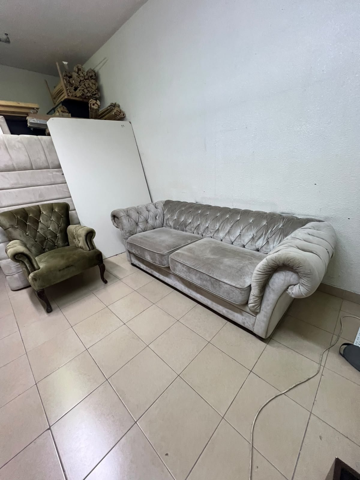 Classic Chesterfield-style furniture upholstered in velvet, featuring a long grey or silver sofa with a button-tufted backrest, accompanied by a matching armchair (fauteuil) in a dark green or olive shade, sharing the same plush, classic design. - Image 11