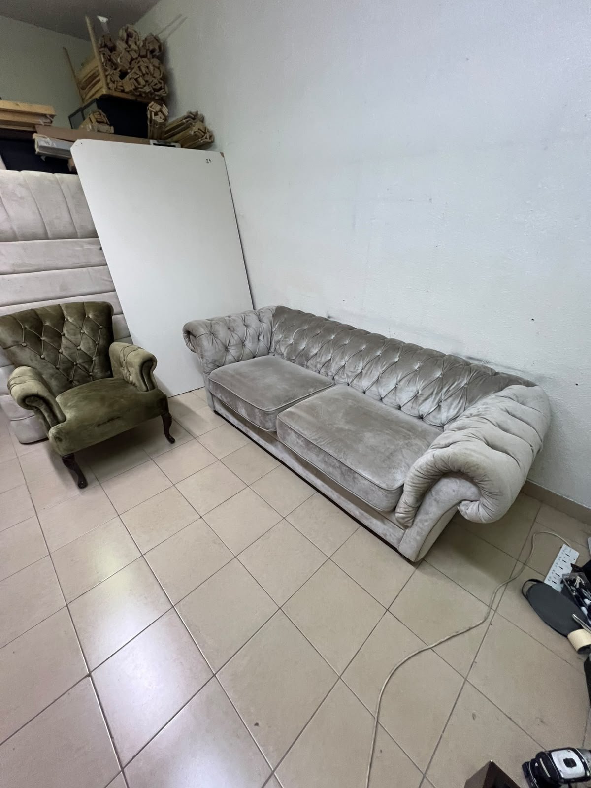Classic Chesterfield-style furniture upholstered in velvet, featuring a long grey or silver sofa with a button-tufted backrest, accompanied by a matching armchair (fauteuil) in a dark green or olive shade, sharing the same plush, classic design. - Image 12
