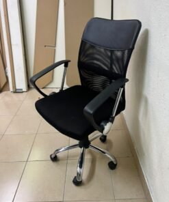 A black office chair featuring a comfortable mesh back, a chrome metal base with casters, armrests, and adjustable height. - Image 3