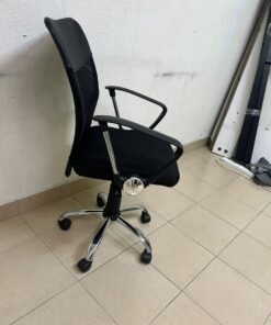 A black office chair featuring a comfortable mesh back, a chrome metal base with casters, armrests, and adjustable height. - Image 8