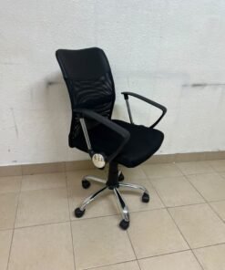 A black office chair featuring a comfortable mesh back, a chrome metal base with casters, armrests, and adjustable height. - Image 9