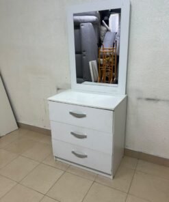 A white vanity table (dressing table) with 3 drawers and an attached mirror,