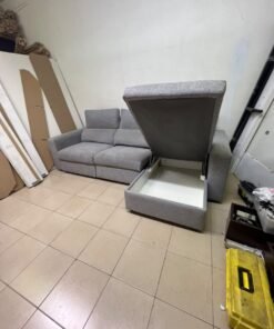 A grey L-shaped sofa bed with a high backrest and recliner seat, which closely matches the IKEA ESKILSTUNA model. Includes storage. - Image 9
