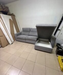A grey L-shaped sofa bed with a high backrest and recliner seat, which closely matches the IKEA ESKILSTUNA model. Includes storage. - Image 7