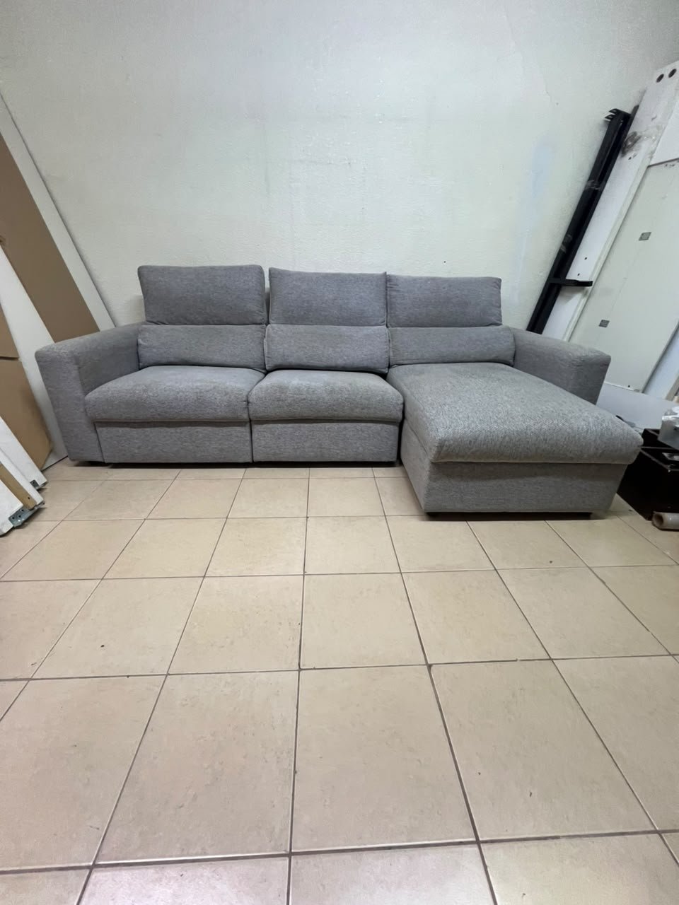 A grey L-shaped sofa bed with a high backrest and recliner seat, which closely matches the IKEA ESKILSTUNA model. Includes storage. - Image 6