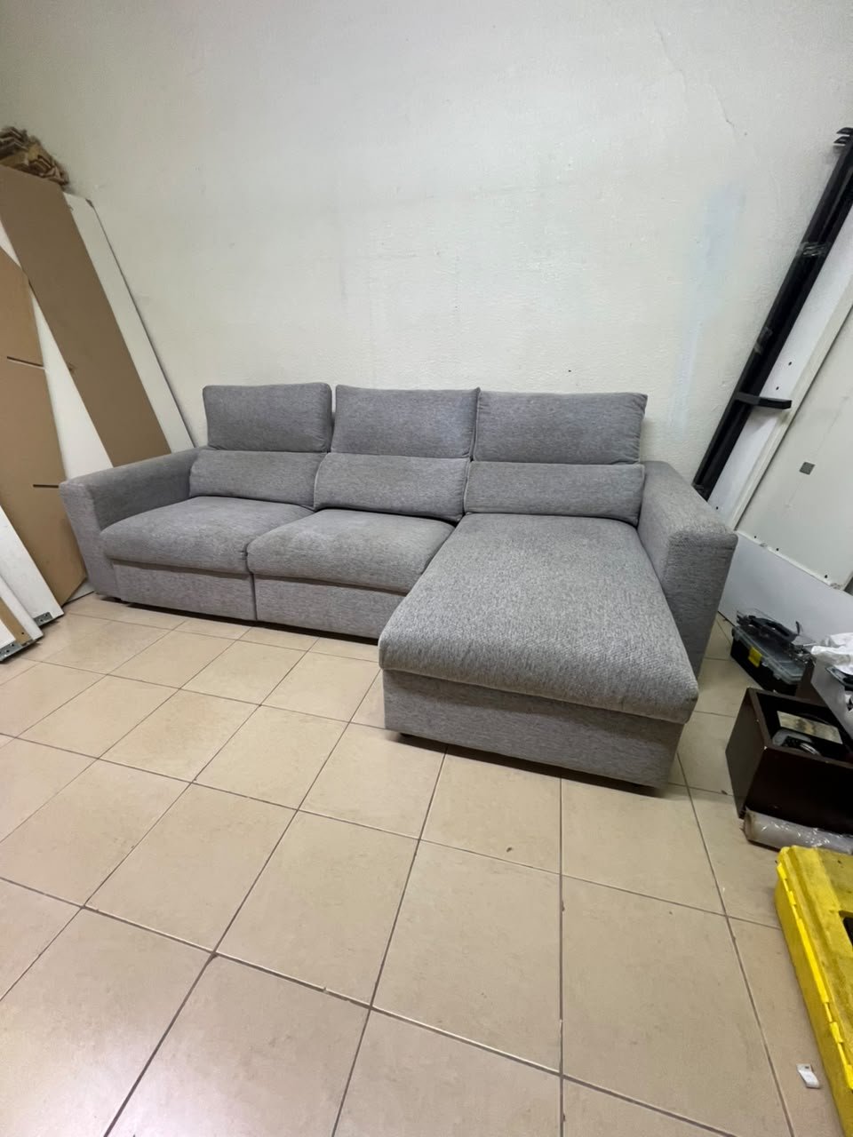 A grey L-shaped sofa bed with a high backrest and recliner seat, which closely matches the IKEA ESKILSTUNA model. Includes storage. - Image 5