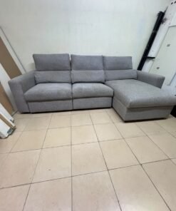 A grey L-shaped sofa bed with a high backrest and recliner seat, which closely matches the IKEA ESKILSTUNA model. Includes storage. - Image 4