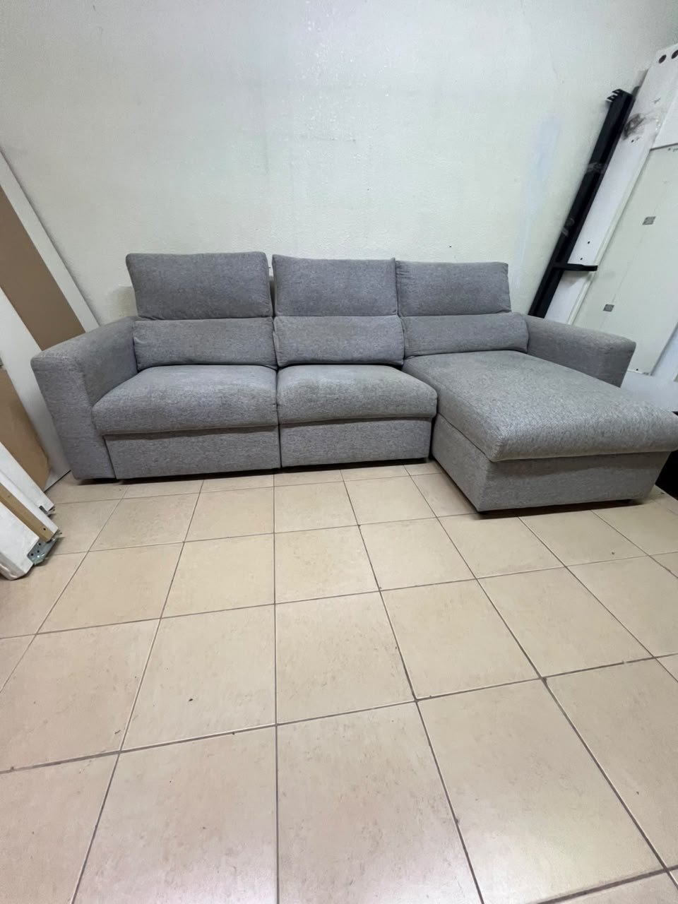 A grey L-shaped sofa bed with a high backrest and recliner seat, which closely matches the IKEA ESKILSTUNA model. Includes storage. - Image 4