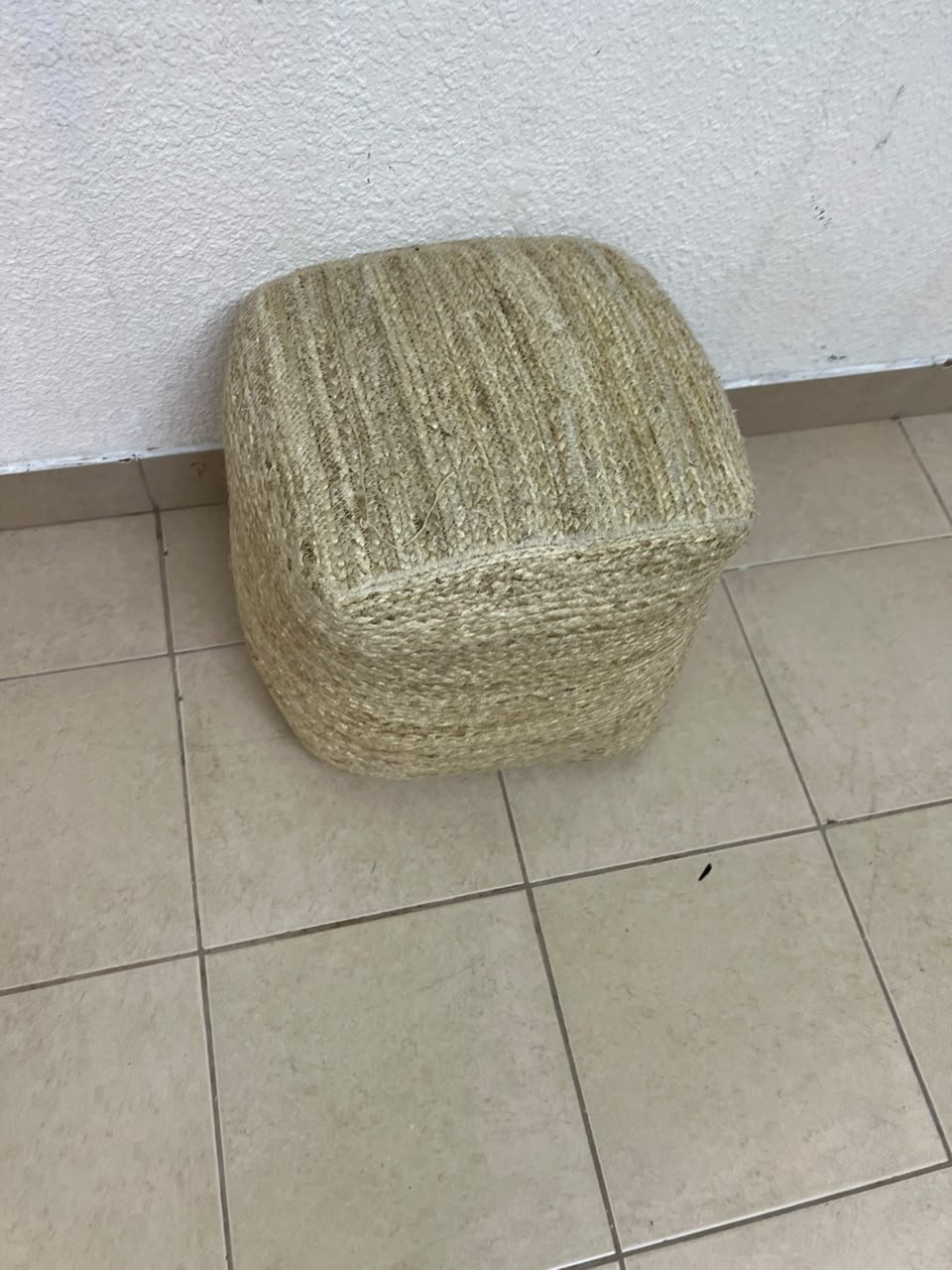 A square-shaped pouf made from braided natural jute fibers. - Image 7