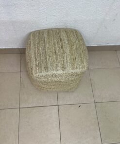 A square-shaped pouf made from braided natural jute fibers. - Image 3