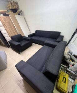 A black sofa set consisting of a large sofa (3-seater), a medium sofa (2-seater), and an armchair (1-seater), featuring wide armrests and modern metal legs. From Home Centre. - Image 3
