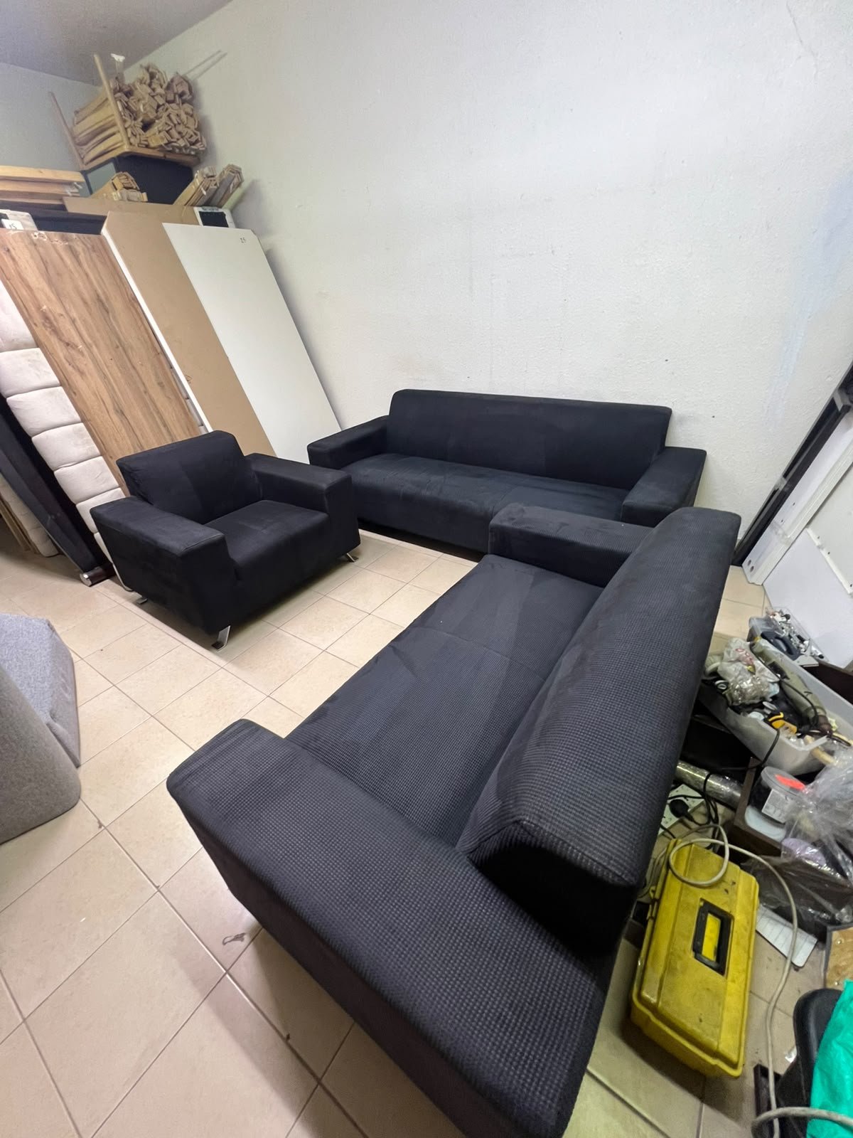 A black sofa set consisting of a large sofa (3-seater), a medium sofa (2-seater), and an armchair (1-seater), featuring wide armrests and modern metal legs. From Home Centre. - Image 3