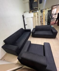 A black sofa set consisting of a large sofa (3-seater), a medium sofa (2-seater), and an armchair (1-seater), featuring wide armrests and modern metal legs. From Home Centre. - Image 7