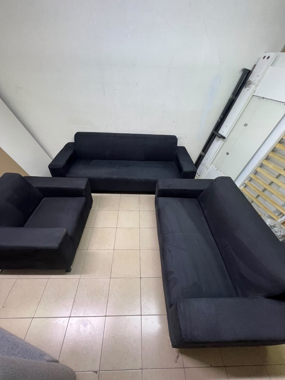 A black sofa set consisting of a large sofa (3-seater), a medium sofa (2-seater), and an armchair (1-seater), featuring wide armrests and modern metal legs. From Home Centre. - Image 14