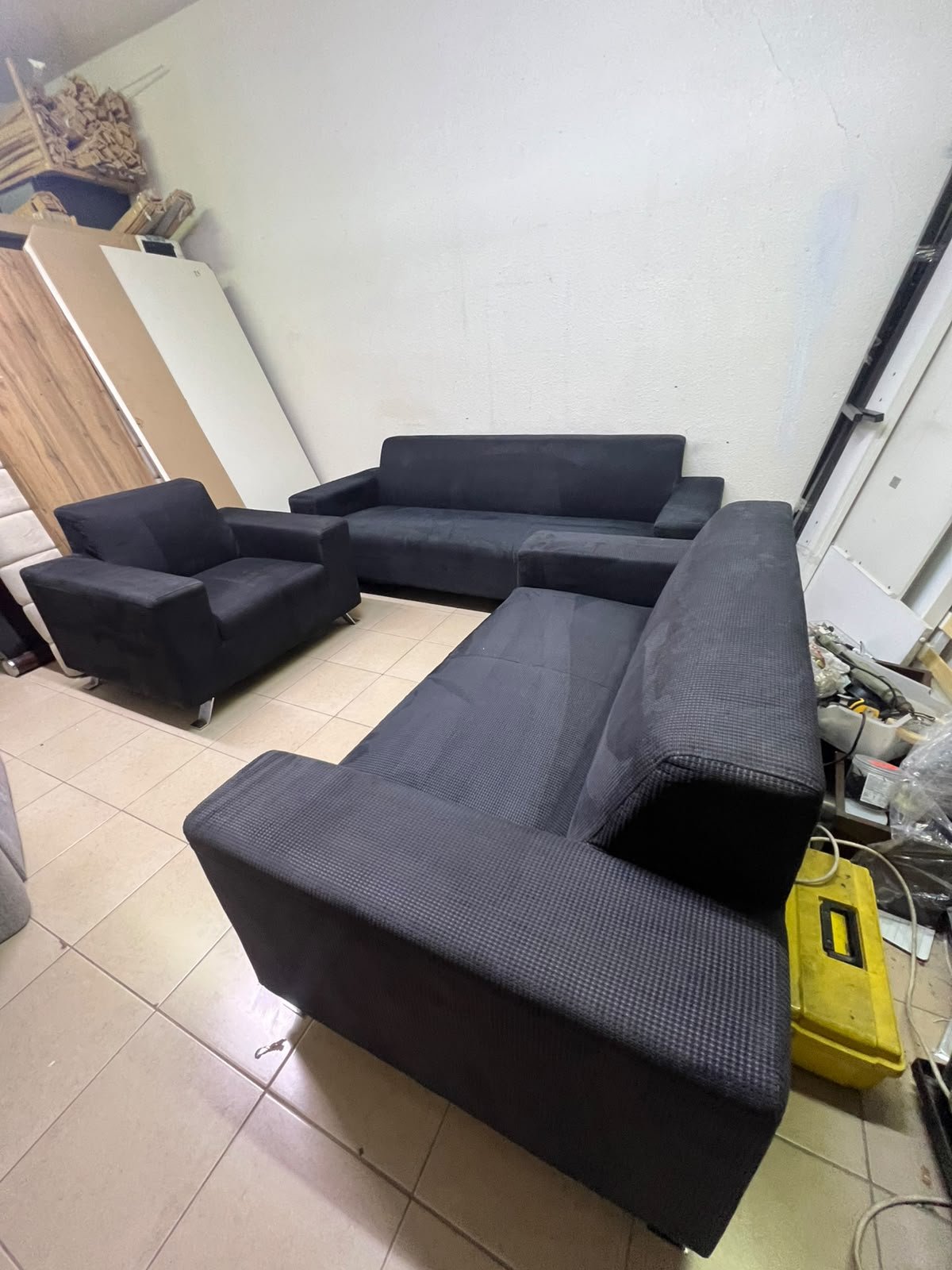A black sofa set consisting of a large sofa (3-seater), a medium sofa (2-seater), and an armchair (1-seater), featuring wide armrests and modern metal legs. From Home Centre. - Image 11