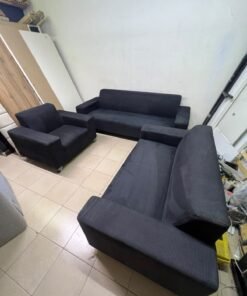 A black sofa set consisting of a large sofa (3-seater), a medium sofa (2-seater), and an armchair (1-seater), featuring wide armrests and modern metal legs. From Home Centre. - Image 9