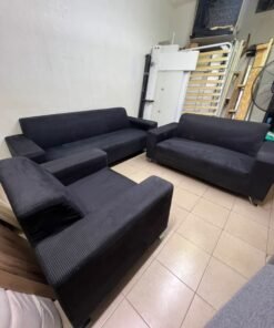 A black sofa set consisting of a large sofa (3-seater), a medium sofa (2-seater), and an armchair (1-seater), featuring wide armrests and modern metal legs. From Home Centre. - Image 15