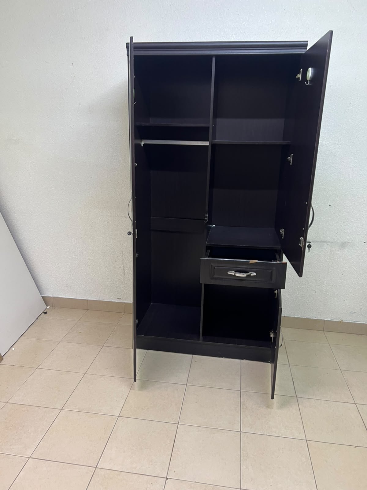 A dark brown (wenge-colored) wooden wardrobe featuring two doors—one of which has an upper mirror—along with a central drawer and a small cabinet (door) at the bottom. - Image 7