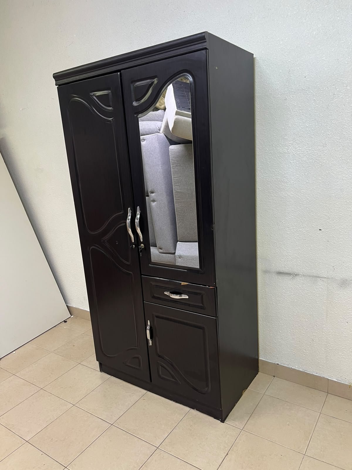 A dark brown (wenge-colored) wooden wardrobe featuring two doors—one of which has an upper mirror—along with a central drawer and a small cabinet (door) at the bottom. - Image 8