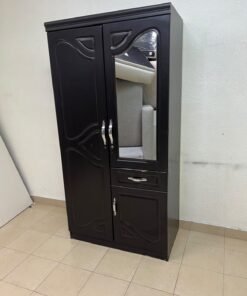 A dark brown (wenge-colored) wooden wardrobe featuring two doors—one of which has an upper mirror—along with a central drawer and a small cabinet (door) at the bottom.